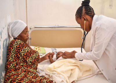 Doctor examining a patient at paediatric ward